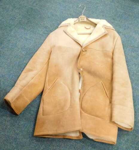 A sheepskin style coat, three quarter length.