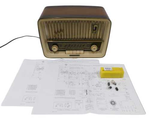 A vintage Telefunken cased radio, marked Jubilate 8, with buttons and meshwork front, 24cm high,...