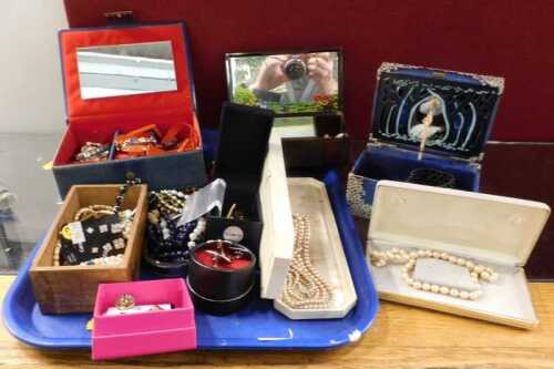 Various costume jewellery and effects, faux beads, a musical jewellery box containing various...