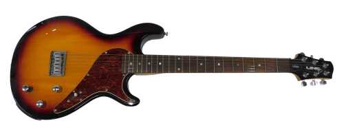 A Line Six Variax 500 electric modelling guitar, in orange colourway, with six strings, numbered...