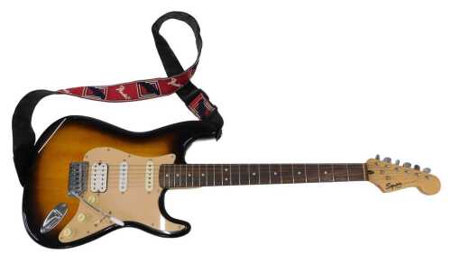 A Fender Squier electric guitar, in brown and cream colourway, six strings, numbered S/N ICS...