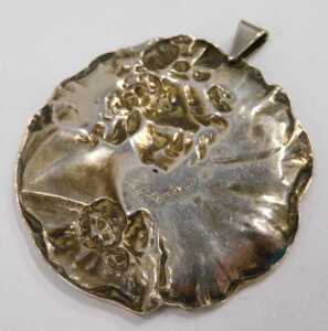 A Victorian silver pendant, moulded as a waterlily with embossed figure of female with flowing... - 2