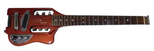 A Traveler Speedster electric guitar, in red and chrome colours, with six strings, numbered...