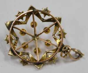 An Edwardian cultured pearl pendant, formed as a star, with rose gold and seed pearl points,... - 2