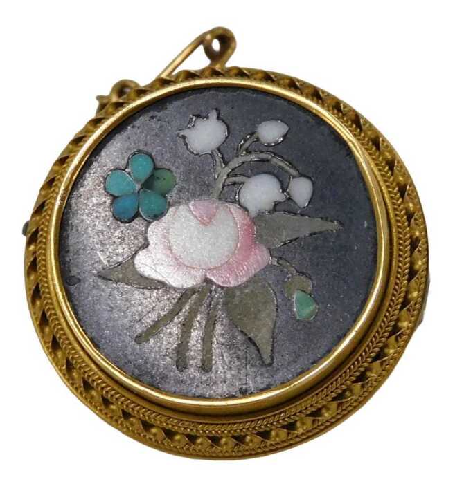 A Pietra Dura circular brooch, the central blackened panel with rose spray flower detail, in a...