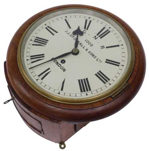 A late 19thC railway clock, the 20cm diameter Roman numeric dial marked GNR, numbered 1008,...