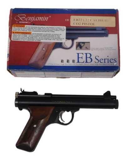 A Crosman Benjamin EB .22 calibre CO2 pistol, with wooden grips. 
A photographic identity...