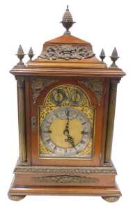 A 19thC mahogany chiming and musical bracket clock, in an elaborate case, with pineapple finial,...