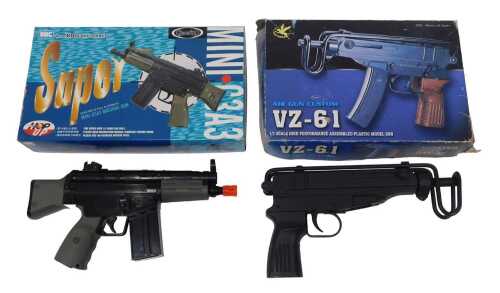 A UNC 6mm BB bullet novelty miniature machine gun, together with a VZ61 BB gun. 
A photographic...