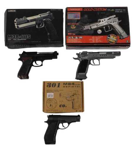 A Tanfoglio gold custom CO2 powered .177 air pistol, together with a Lorcin M38-111S CO2 powered...