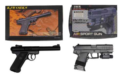 A KJW Works CO2 powered 4.5mm BB gun, together with a Hellfire 6mm compact BB gun, with an...