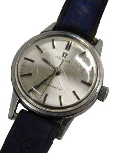 An Omega Seamaster ladies wristwatch, with a small silvered baton dial, in stainless steel case,...