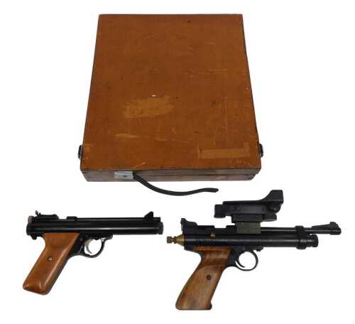 An E9A series 4.5mm or .177 air pistol, together with a second similar air pistol, with top...