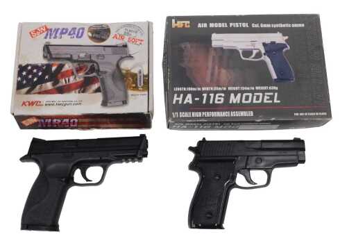 A KWC Gun Company Smith and Wesson MP40 6mm CO2 powered air pistol, together with a HFC HA-116...