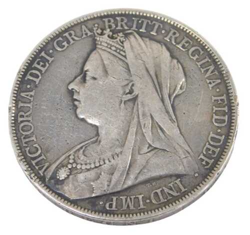 A Queen Victoria silver crown coin 1900, in outer capsule.