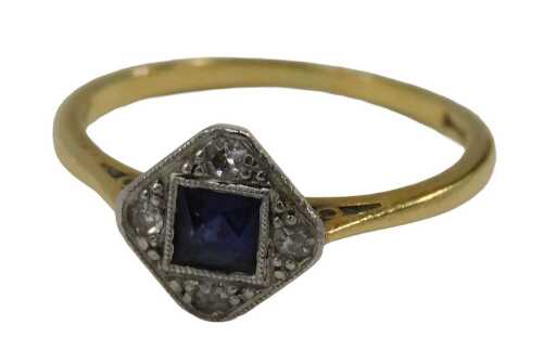 A sapphire and diamond Art Deco style dress ring, the diamond shaped ring head centred by a...