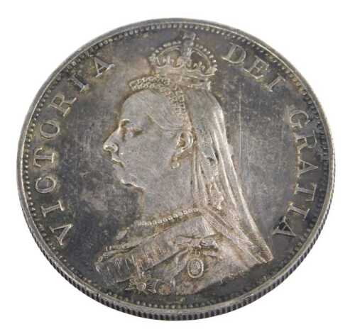 A Queen Victoria double florin coin 1888, in outer capsule.