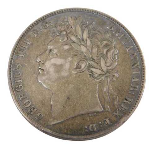 A George IV silver half crown coin 1823, in outer capsule.
