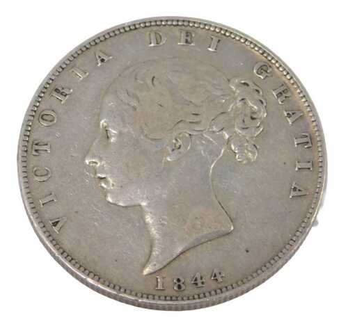 A Queen Victoria silver half crown coin 1844, in outer capsule.