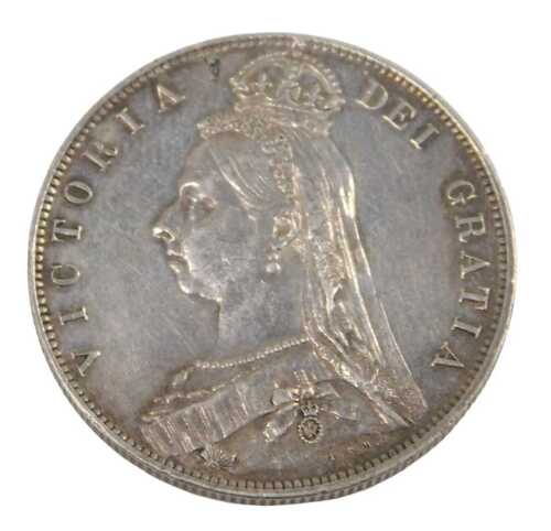 A Queen Victoria silver half crown coin 1889, in outer capsule.