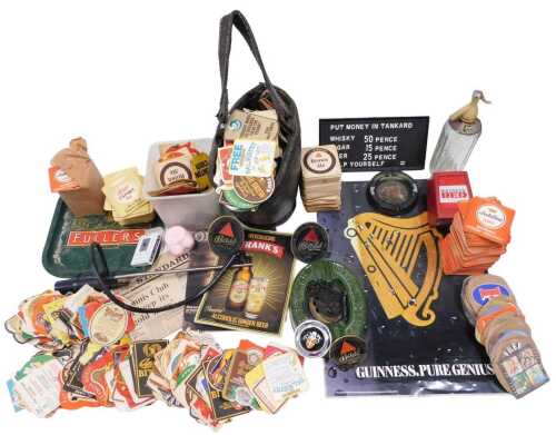 Various breweriana, etc., to include an early leather 20thC fire bucket containing a quantity of...