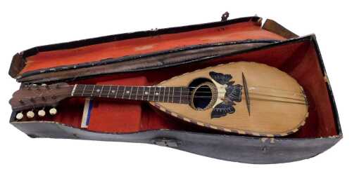 An early 20thC rosewood and inlaid Strident mandolin, with bone tuning knops, and partially...