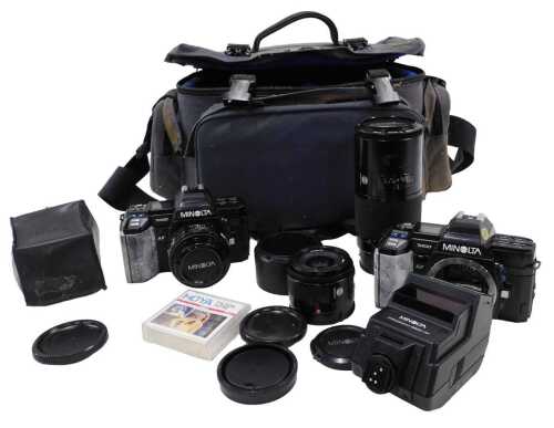 Various cameras and related items, a Minolta lens 1:2.8 (22) with lens cap, 5cm high, a further...