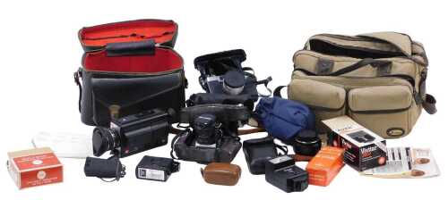 Various cameras and related items, flash units, Kodak cameras, a GAF autozoom 714 camera with...