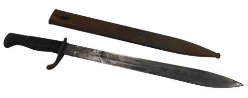 A Weyersberg Mauser bayonet, with shaped blade, turned grip, compressed metal pommel, with metal...