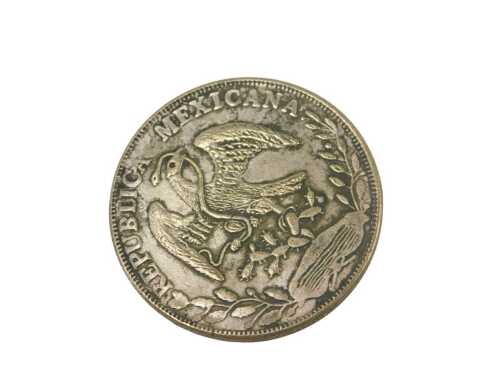 A Mexican silver eight reals coin, or piece of eight.