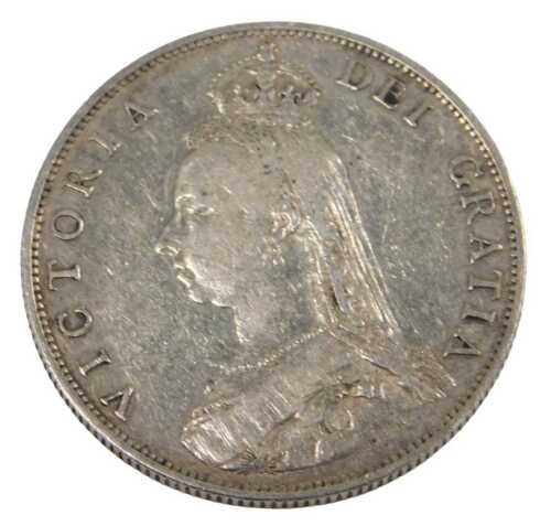 A Queen Victoria silver florin coin 1887, in outer capsule.