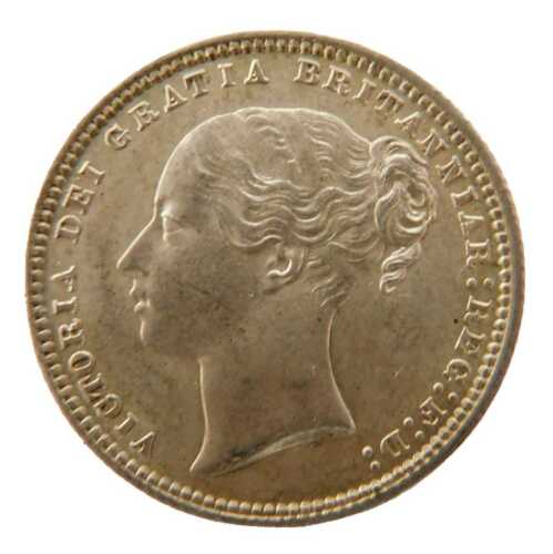 A Queen Victoria silver shilling coin 1872, in outer capsule.