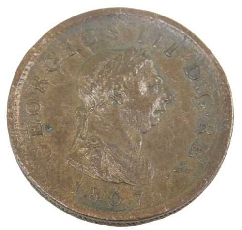 A George III penny coin 1807, in outer capsule.