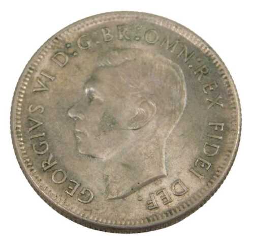 A George VI Australian florin coin 1951, in outer capsule.