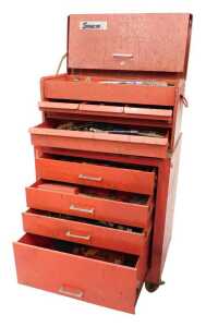 A Snap-On tool cabinet, the upper section with front hinged opening section above three long...