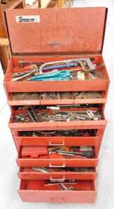 A Snap-On tool cabinet, the upper section with front hinged opening section above three long... - 2