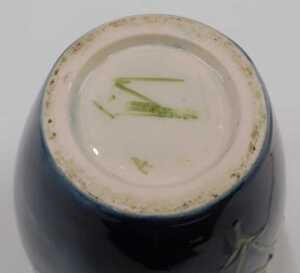 A Moorcroft pottery Hibiscus pattern vase, on a green ground, 20cm high. - 2