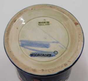 A Moorcroft pottery Leaf and Berry pattern goblet vase, on blue ground, 15cm high. - 2