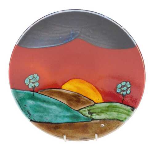 A Poole pottery Sunrise pattern plate, of circular form, 24cm diameter.