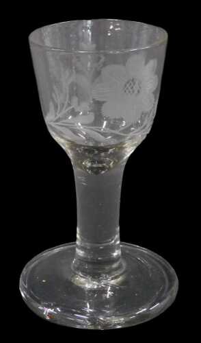 An English cordial glass, with bell shaped bowl, etched with flowers, on plain stem and circular...