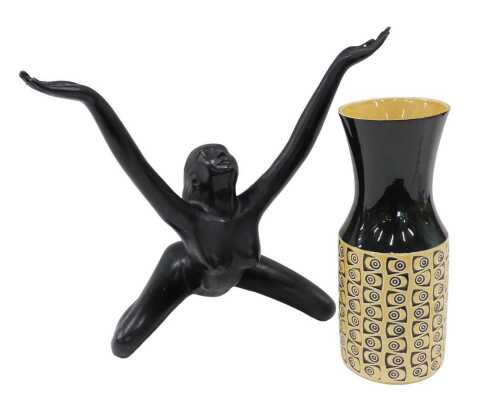 A West German vase, together with an Art Deco style figure of a nude lady seated with arms...