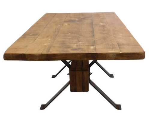 A rustic dining table, with wooden top and metal fittings, together with welding mask and...