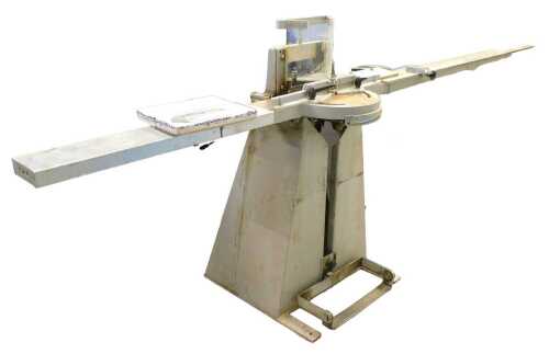 An artist's guillotine, on metal stand, articulated cogwheel to the centre, 125cm high, 297cm...