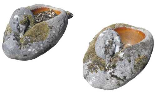 A pair of 20thC stone swan design troughs, 41cm high, 75cm wide, 38cm deep. (2)