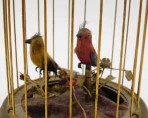 A 20thC Continental bird cage automaton, with two birds, partially feathered on a metal floral... - 3