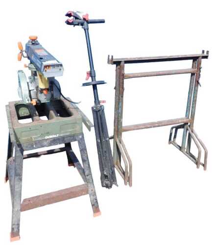 A DeWalt Power Shop circular radial arm saw, DW125 style, on iron frame stand, 125cm high, and...