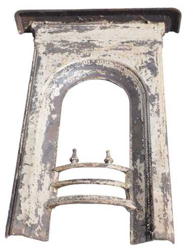 A late 19thC cast iron single fire surround of small proportion, with fixed grate front, 87cm...