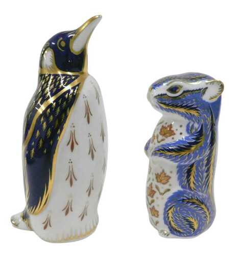 A Royal Crown Derby paperweight ornament Emperor Penguin, silver gilt stopper, 16cm high, and...