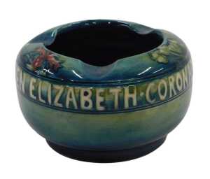 A Moorcroft pottery George VI and Queen Elizbeth ash tray, of compressed circular form,...