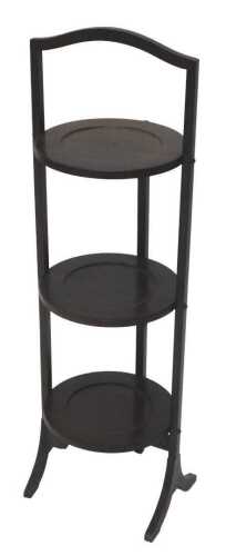 An early 20thC mahogany three tier cake stand, with arched frame and circular sections, on...